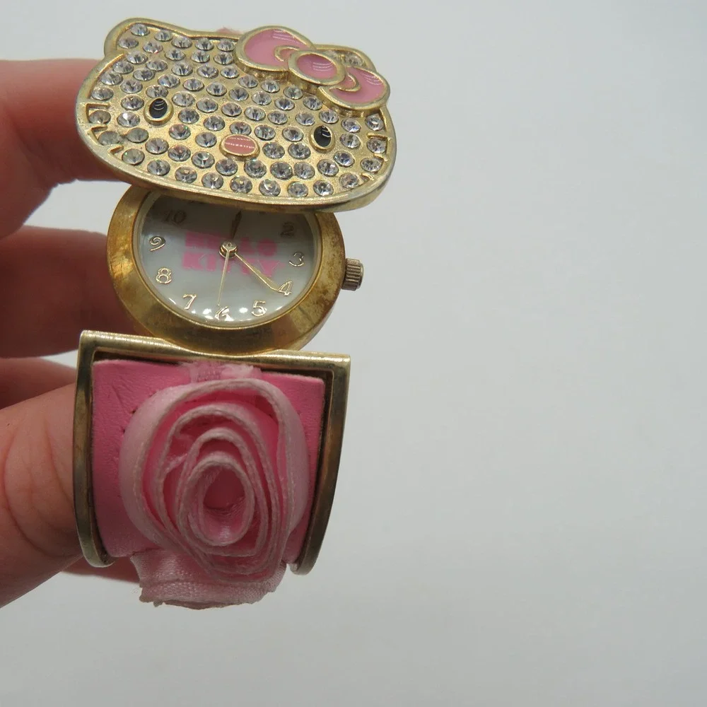 Sanrio Hello Kitty Rhinestone Flip Top Bangle Watch Pink Rosette Gold Tone Y2K
